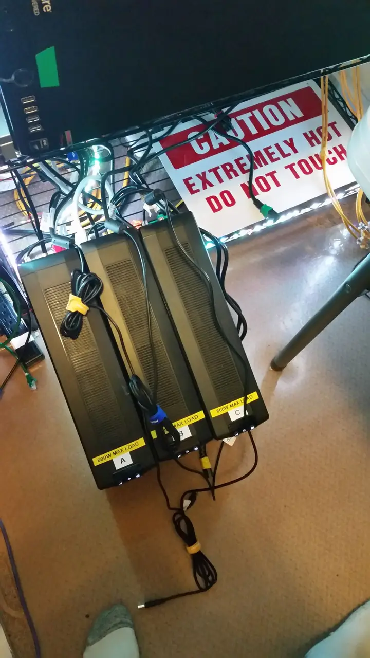UPS batteries with labeled power cables during the rack rebuild