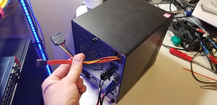 SATA data and power cables routed outside the Thecus N5550 case