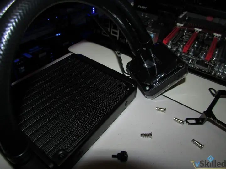 Liquid CPU cooler radiator and pump before installation
