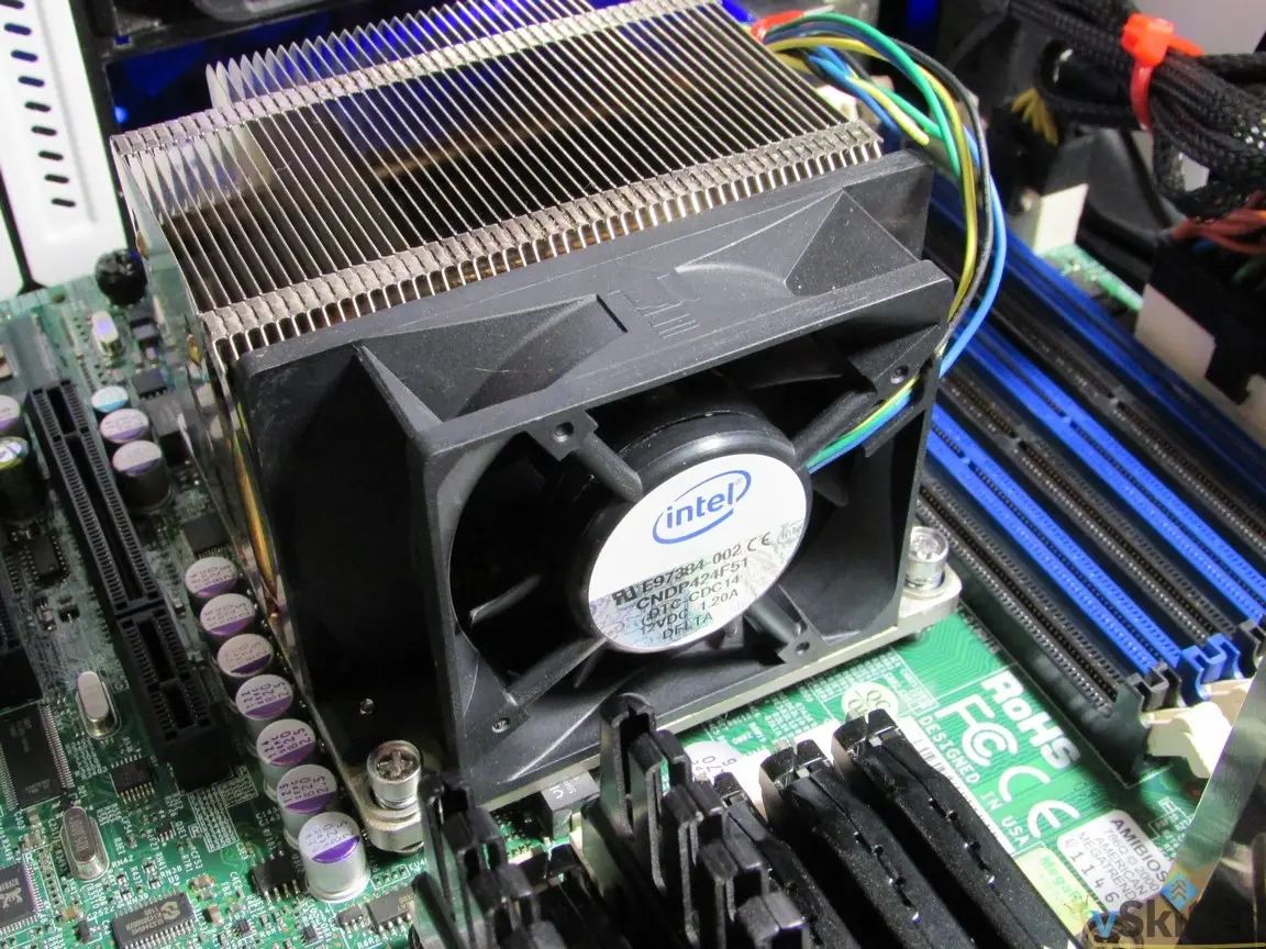 Close-up of an Intel CPU cooler and memory slots on the server motherboard
