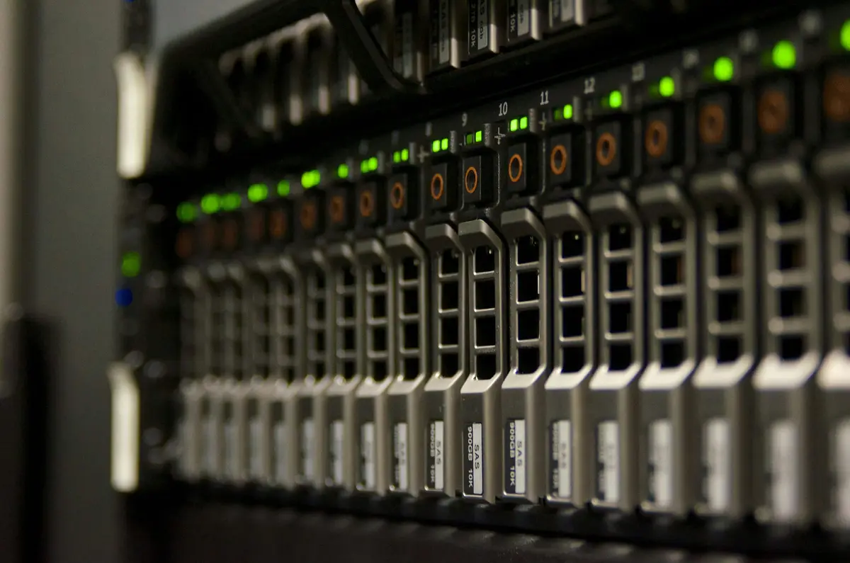 Rows of server drive bays with green status lights