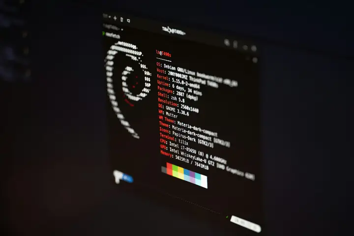 Photographed Linux terminal displaying system information