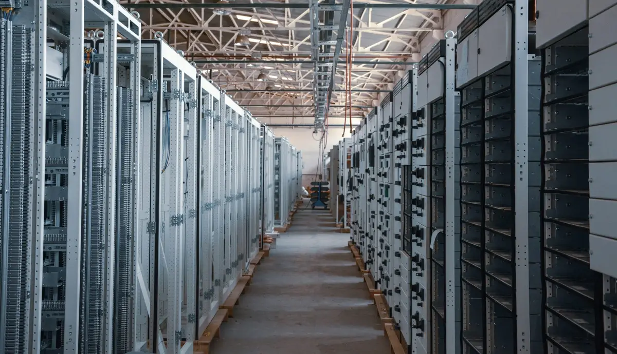 Aisle between rows of equipment racks in a data centre
