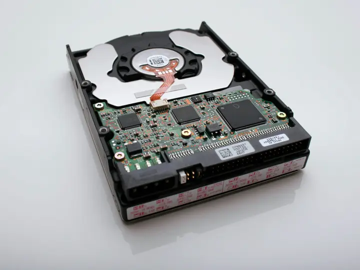 Hard disk drive with its circuit board and metal casing exposed